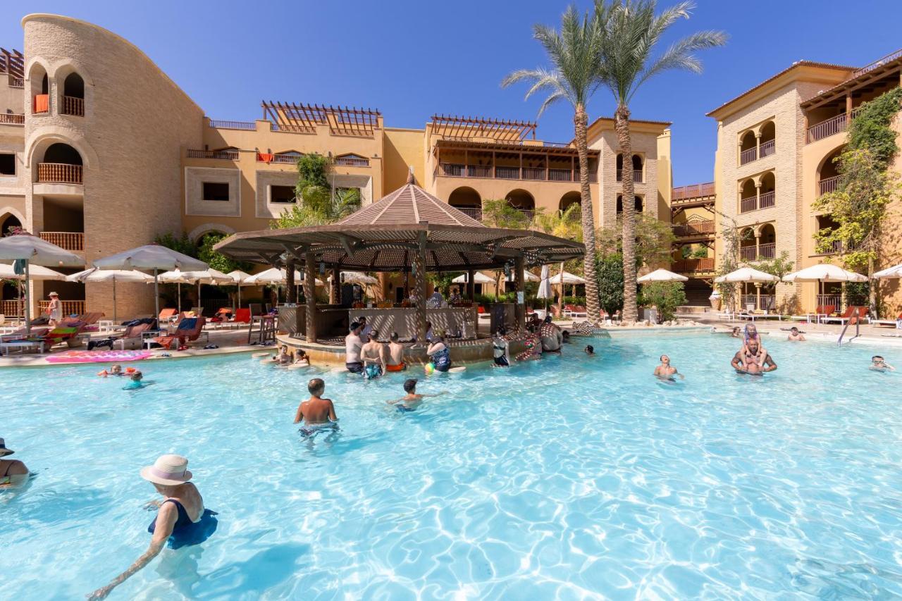 Grand Waterworld Makadi Family Star - Couples And Families Only Otel Hurgada Dış mekan fotoğraf The swimming pool at the Hilton Sharm El-Sheikh